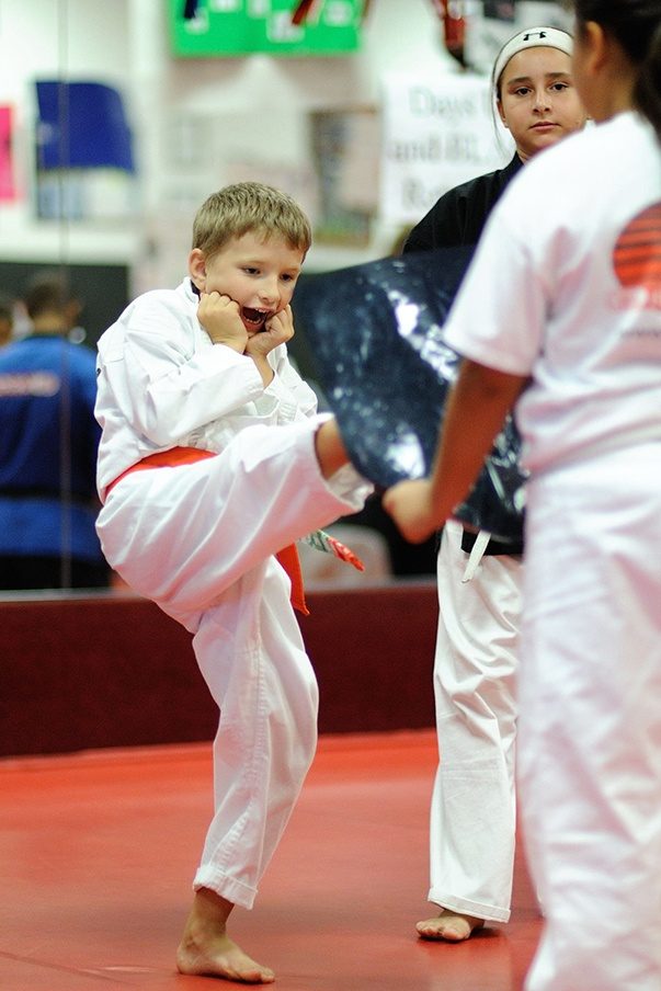 Mile High Karate student practicing a kick