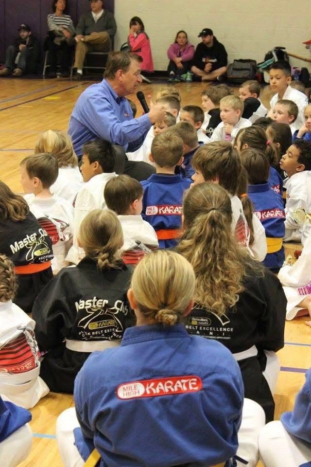Grand Master Stephen Oliver teaching students and families at a Mile High Karate event
